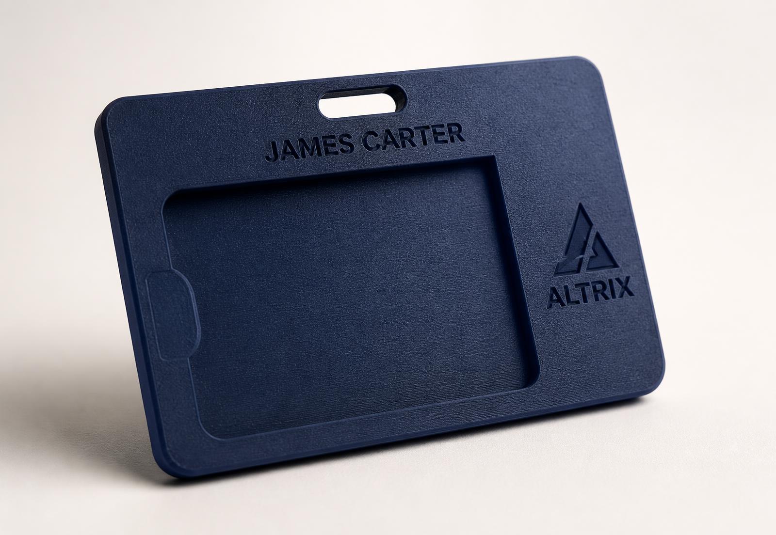Personalised 3D printed ID card holder with a textured navy finish in a studio setting